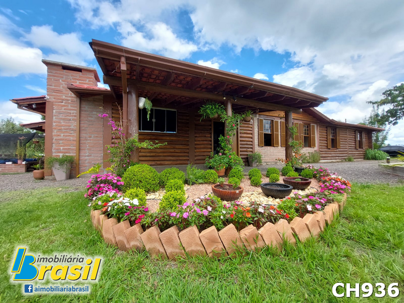 Chácara medindo 2.500m² com casa plana.   